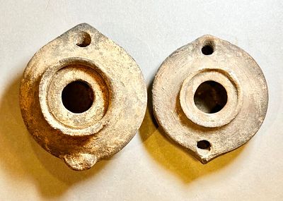 A Lot of 2 Islamic Terracotta Oil Lamps, 7th - 9th century CE. 9.4 and 8.2 cm. In very good 