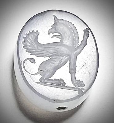 A Graeco-Persian Chalcedony Scaraboid Seal. 4th century BCE. 20.6x17.2x17.1 mm. Lengthwise 