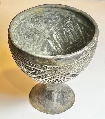 A Small Silver Cup. 2nd cent BCE - 2nd cent CE. 6.9 cm high, the rim is 6.4 cm in diam., 69.6 