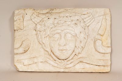 Late Roman Marble Plinth, rectangular shape with border sculpted male head with wings. 