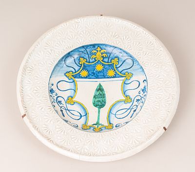 Italian Ceramic Dish, round shape with deepened centre. Floral decorations in reliev technique. 