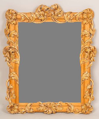Mirror in Manieristic Manner, rectangular shape. Rounded border with rich floral carved 