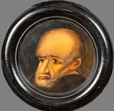 Artist around 1700, physionomic carricature head. Oil on wooden panel. Framed. 7,5 cm diameter.