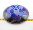 Hand-Painted Volkswagen Hubcap with Blue and Purple Flower Design. A silver hubcap, decorated Image - 4