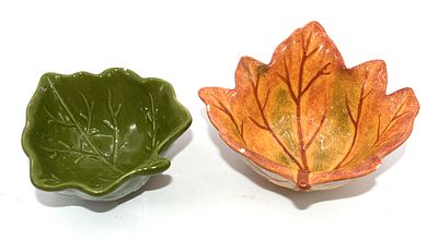 Two Ceramic Fall Harvest Leaf Dishes. Two ceramic leaf-shaped dishes, one green and one 
