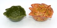 Two Ceramic Fall Harvest Leaf Dishes. Two ceramic leaf-shaped dishes, one green and one Image - 11