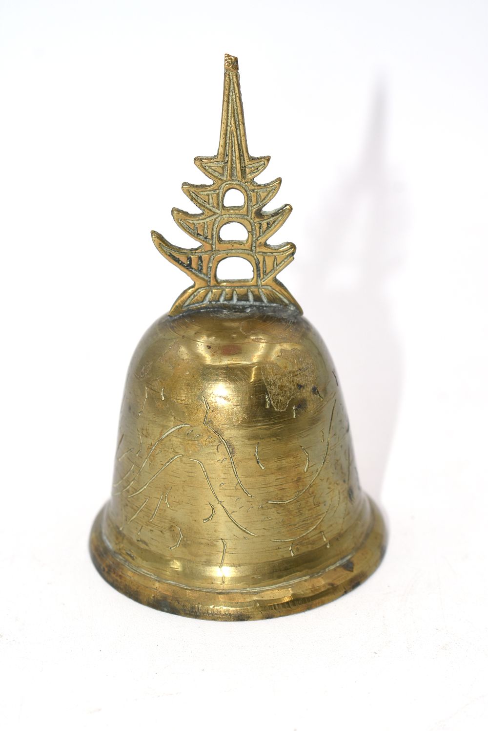 Chinese Brass Temple Pagoda Etched Bell. A brass-colored bell, approximately 4.75" tall 