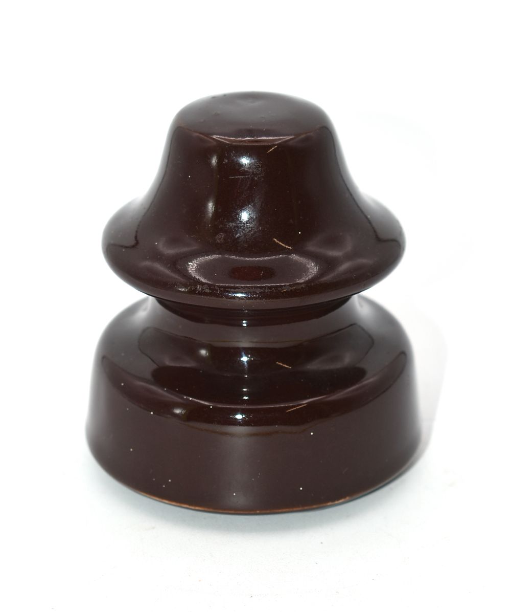 One Vintage Dark Brown Glazed Ceramic Insulator. A dark brown, glazed ceramic insulator 