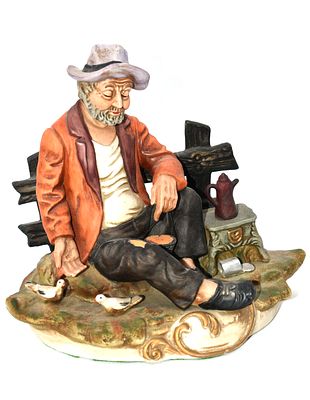 Flambo Porcelain Old Man Hobo Figurine with Birds. A single ceramic figurine, approximately 8.5 