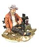 Flambo Porcelain Old Man Hobo Figurine with Birds. A single ceramic figurine, approximately 8.5 Image - 1