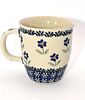 Hand Made Polish Pottery Blue Daisy Floral Mug. A cream-colored ceramic mug, approximately 4.25" Image - 2