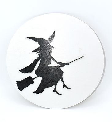 Halloween Witch Silhouette Wooden Wall Decor. A single round, white and black Halloween-themed 