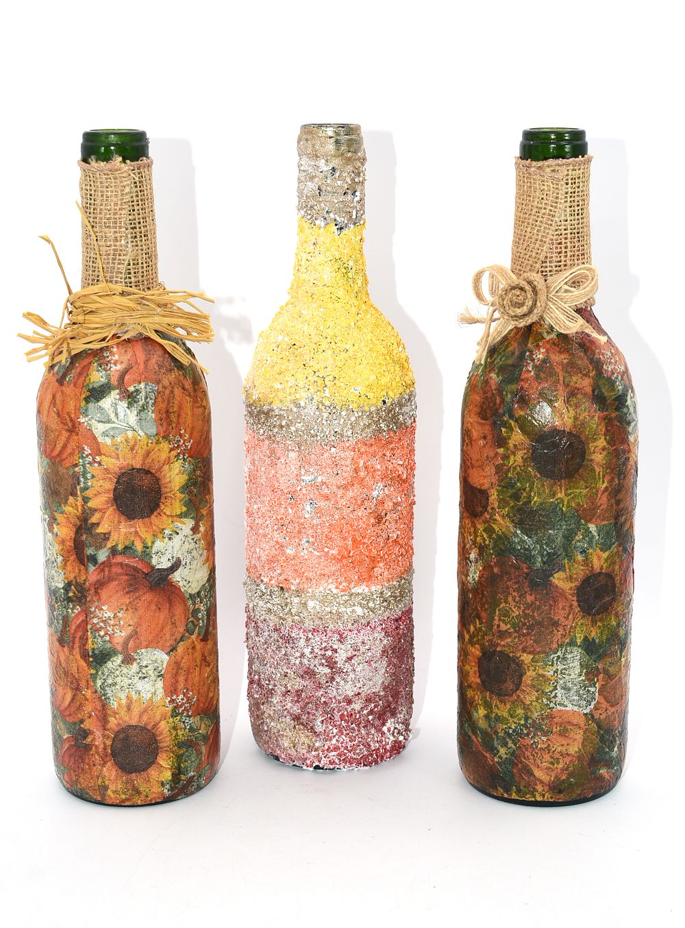 Three Handmade Decorative Bottles. Three decorative bottles, approximately 12 inches tall, two 