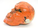 Two Orange and Black Swirl Decorative Skull Figures. Two decorative skull figures, one Image - 4