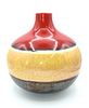 A Multi-Color Glazed Ceramic Fat Lava Vase. A glazed ceramic vase, featuring bands of speckled Image - 1