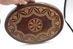 Hand Carved Oval Wooden Plaque or Trivet. A dark brown oval wooden plaque or trivet with carved Image - 2