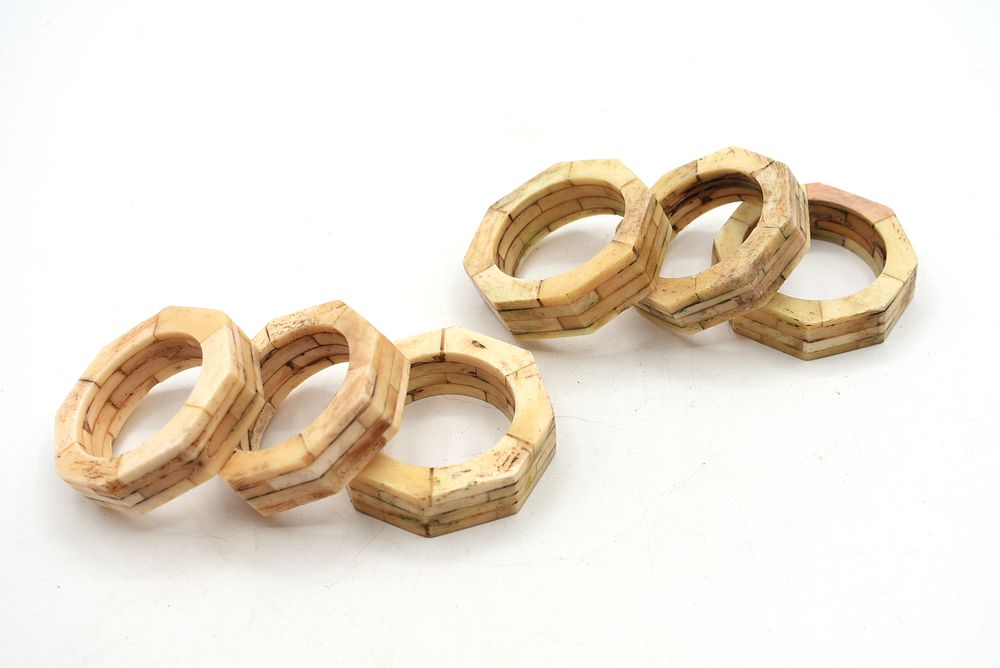 A Set of Six Octagonal Bone-Like napkin rings. A set of six octagonal napkin rings, made of 