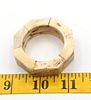 A Set of Six Octagonal Bone-Like napkin rings. A set of six octagonal napkin rings, made of Image - 1