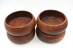 Set of Four Vintage Teak Wood Salad Bowls. A set of four dark brown wooden bowls, likely teak Image - 2