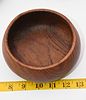 Set of Four Vintage Teak Wood Salad Bowls. A set of four dark brown wooden bowls, likely teak Image - 3