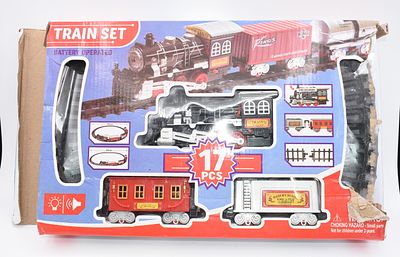 A Boxed Battery-Operated Toy Train Set, 17 Pieces. A boxed, battery-operated toy train set 