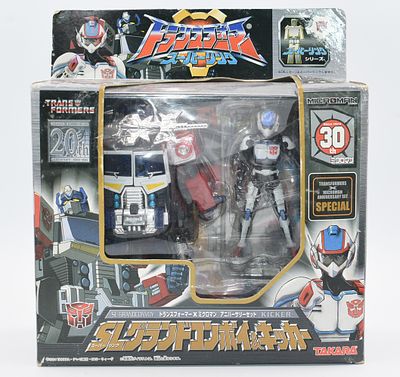 Takara Transformers Microman 20th/30th Anniversary Set: SL Grand Convoy & Kicker, 2004. A boxed 