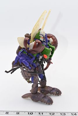 A Hasbro Transformers Beast Wars 1997 Tripredacus Combiner Action Figure. A Hasbro Transformers 