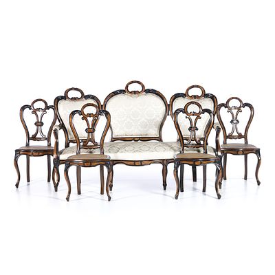 CONJUNTO DE CANAP&Eacute; E QUATRO CADEIRAS. Portugu&ecirc;s do s&eacute;c. XIX, em madeirade pau-santo 