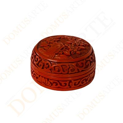 Caixa Cinnabar. laca vermelha Cinnabar, decora&ccedil;&atilde;o relevada com flores, formato redonda. S&eacute;c XX 