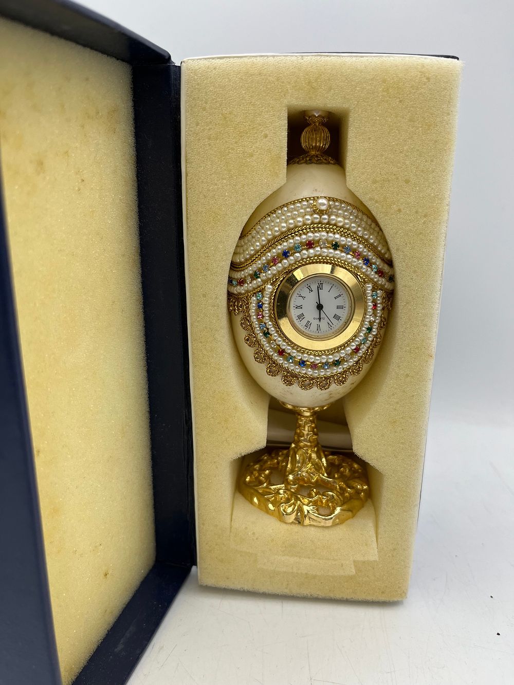 Lot 85: Genuine Goose Egg Quartz Clock, Boxed.