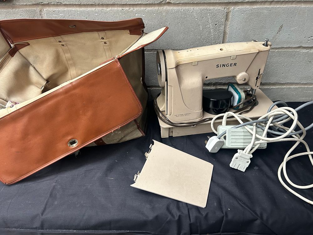 Lot 171: Singer Sewing Machine In Case.
