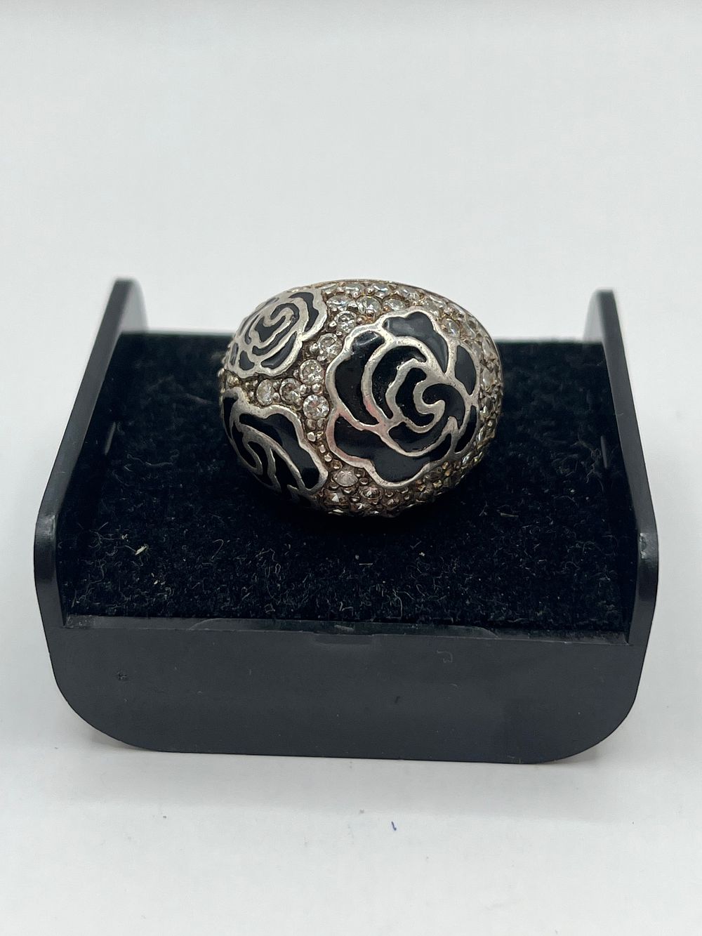 Lot 212: Large Silver Ring With Floral Design Size M.