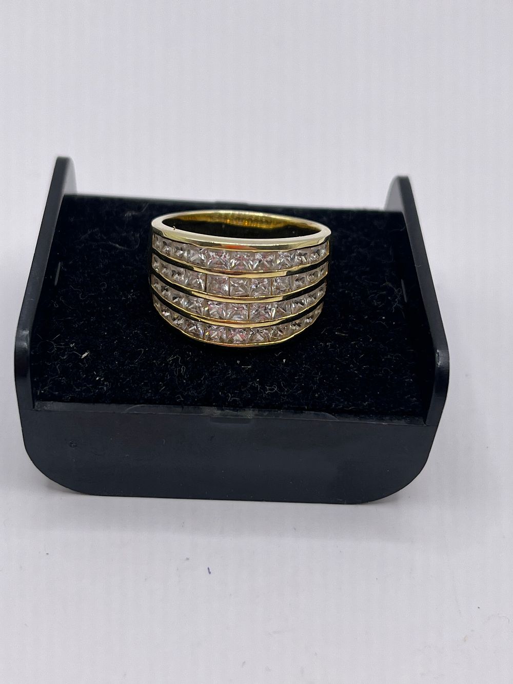 Lot 213: Silver , Gold Coloured Band Size Q.