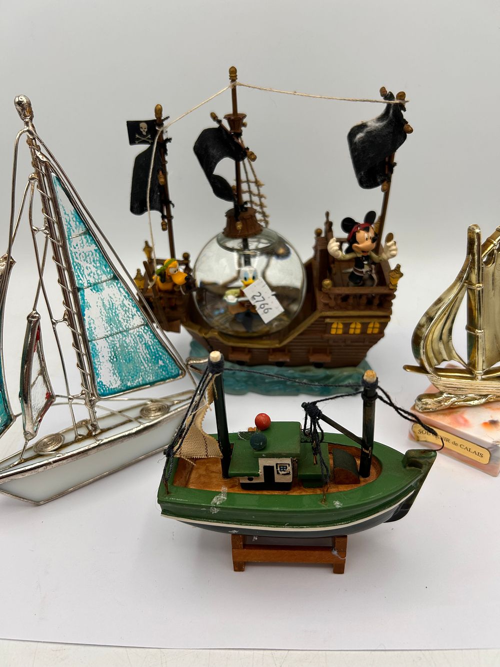 Lot 226: Four Ship Related Figures , One By Disney...