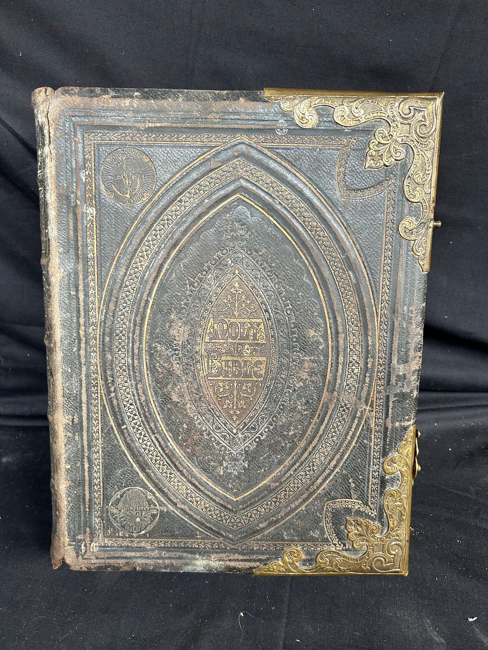 Lot 330: Large Antique Family Bible With Brass Detail.