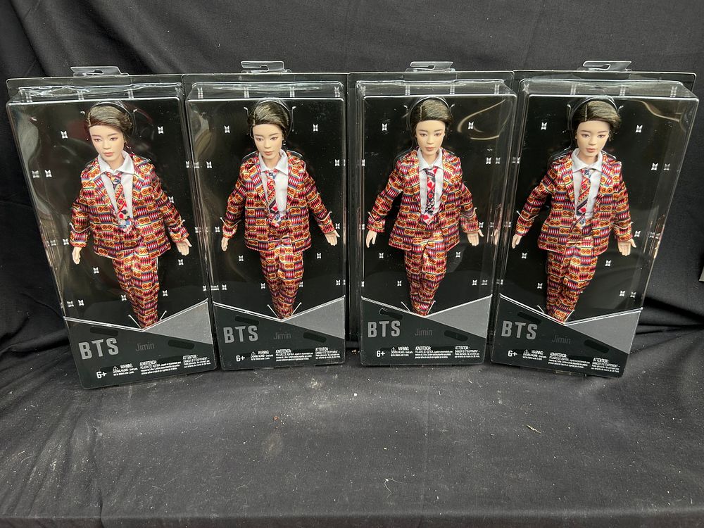 Lot 334: Four New And Boxed 'Jimin' Idol Dolls.
