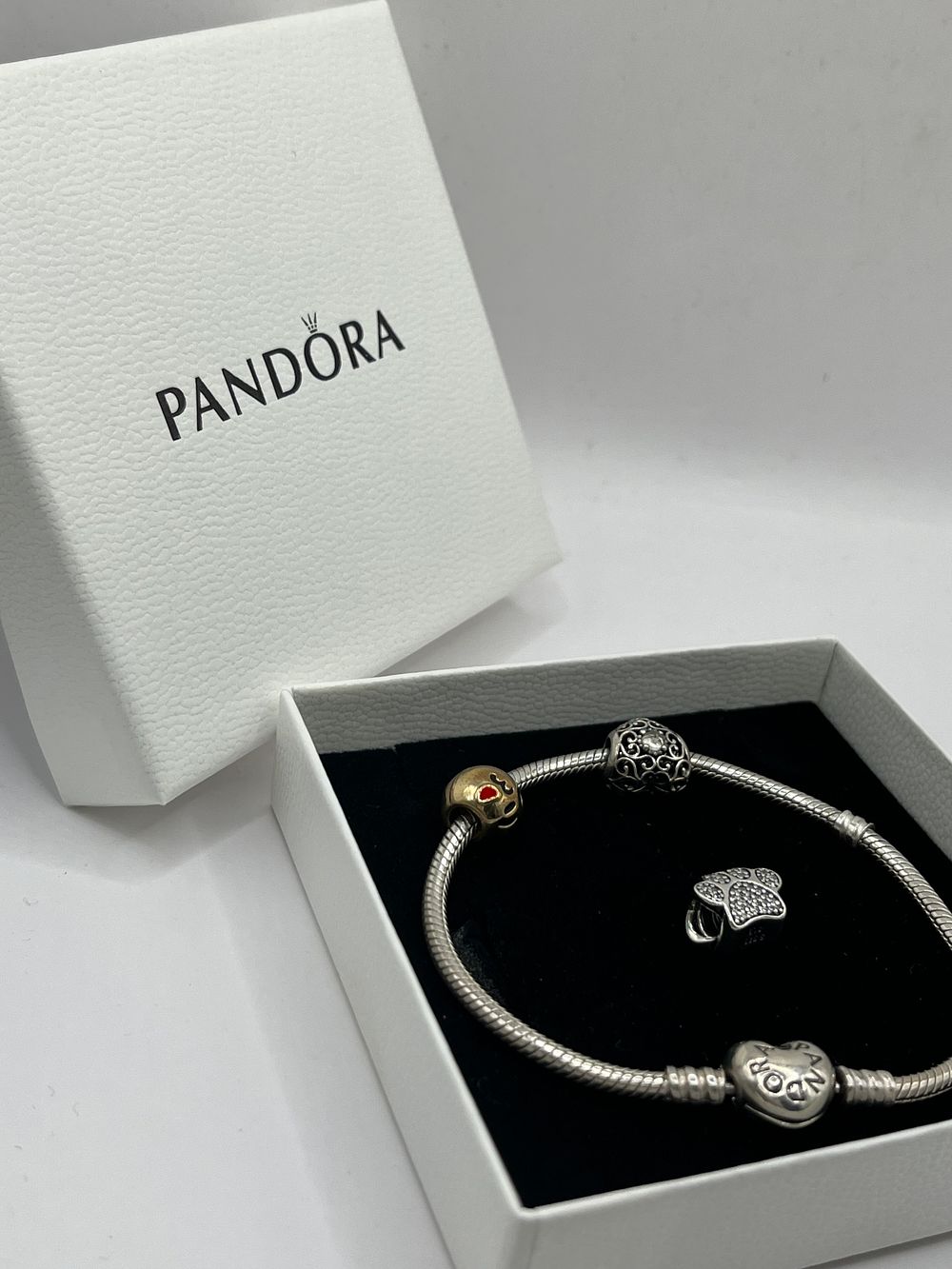 Lot 400: Boxed Pandora Bracelet With Three Charms, Including Paw...