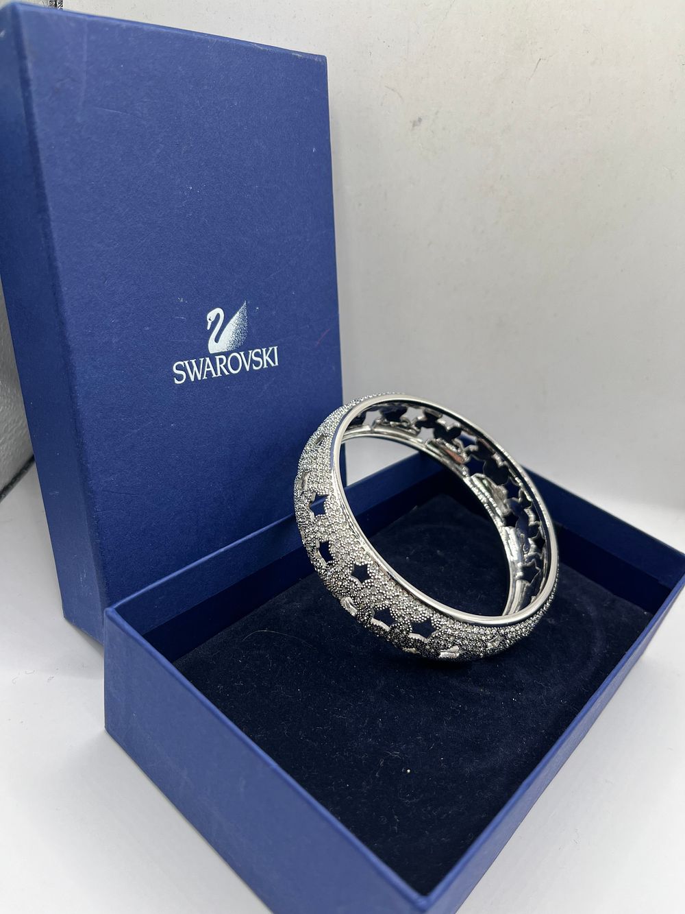 Lot 401: Boxed Swarovski Bangle With Star Detail.
