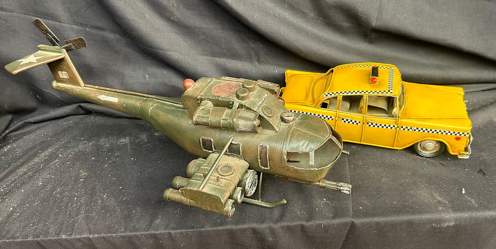 Lot 493: Tin Plate Helicopter 17" x 8" And Car.