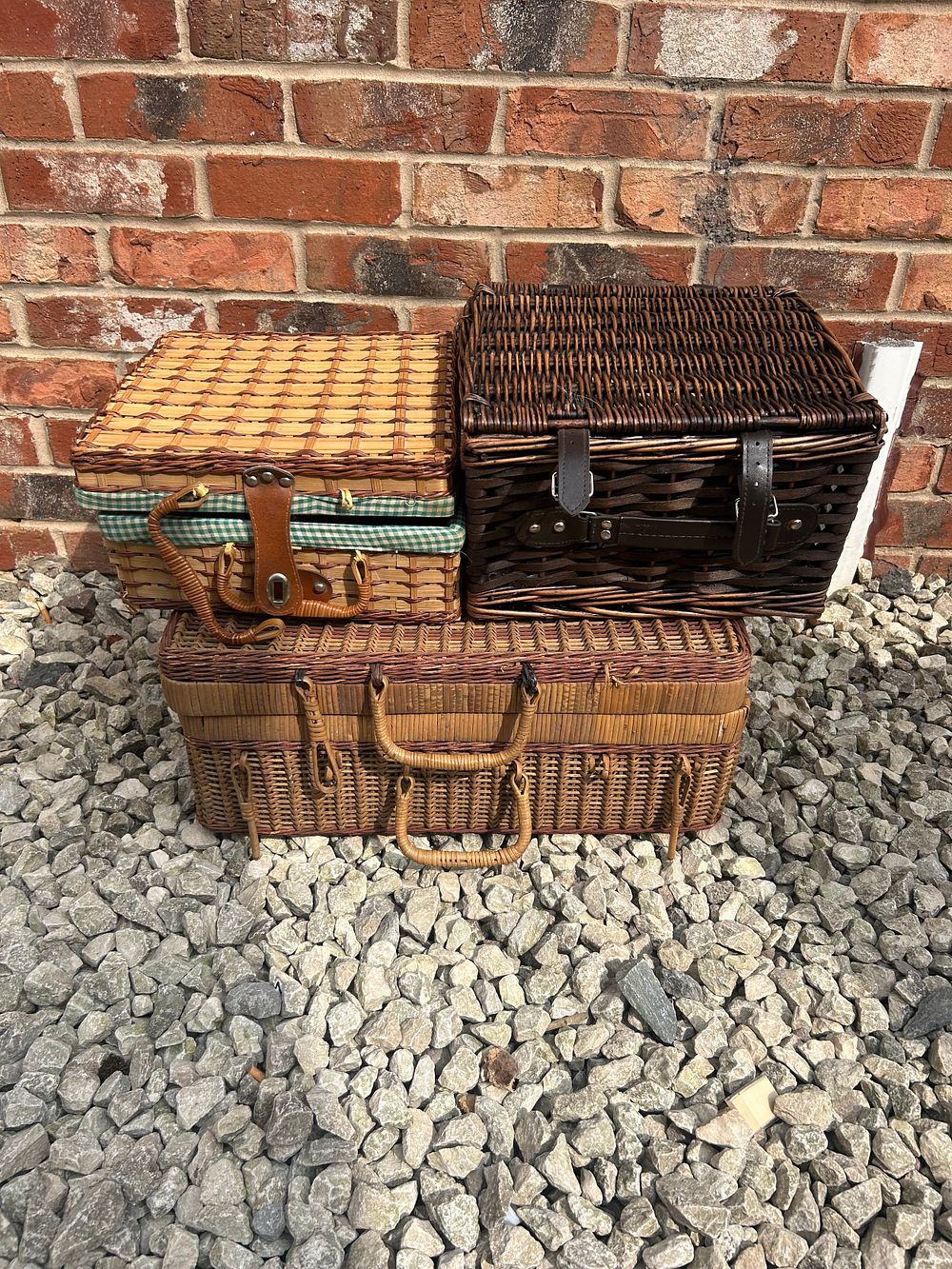 Lot 510: Three Wicker Picnic Baskets.
