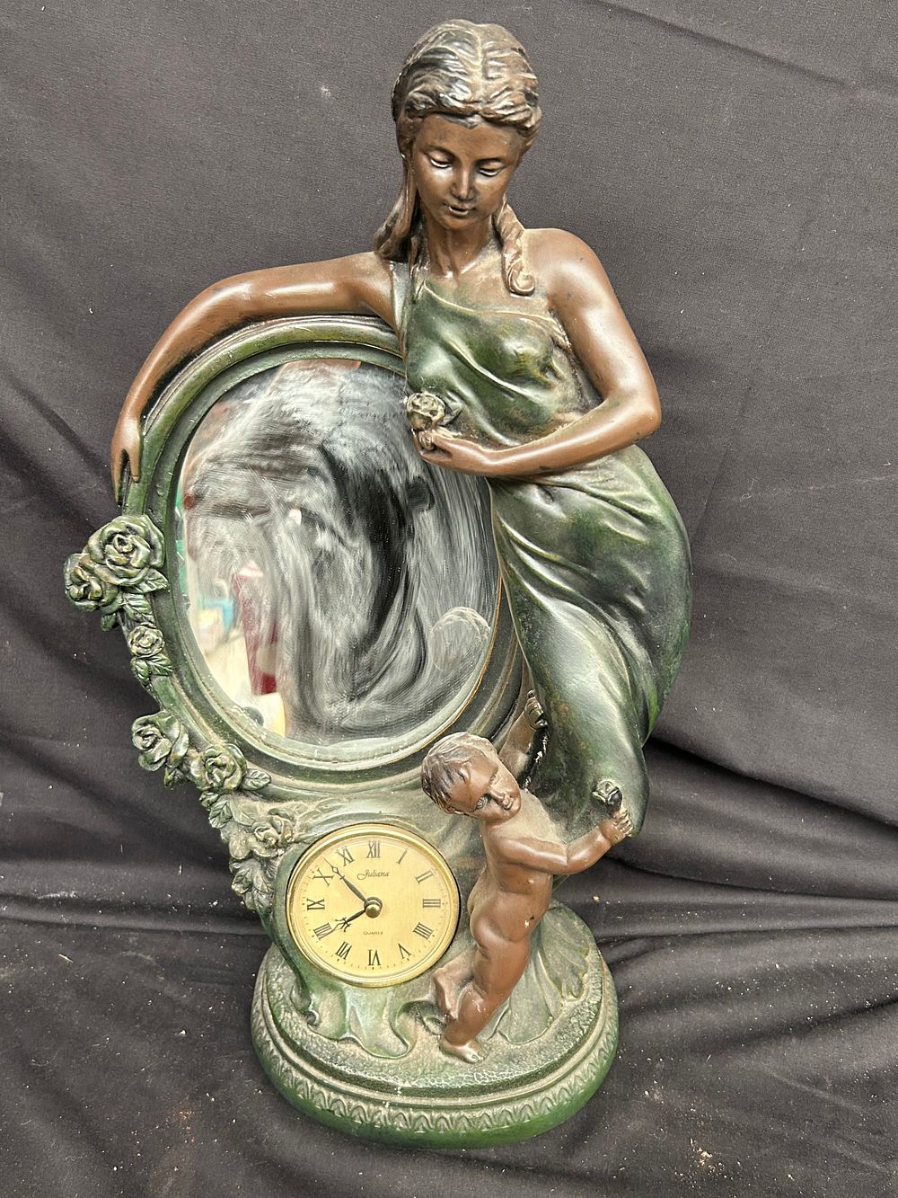 Lot 521: Cherub Mirror With Clock Standing 19"
