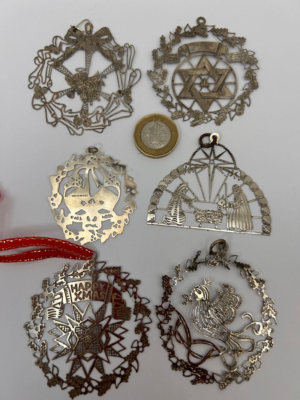 Lot 183: Set Of Six Silver Laser Cut Christmas Decorations.