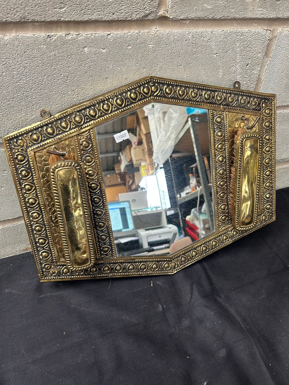 Lot 239: Wall Hanging Brass Vanity Mirror 17"x 14".