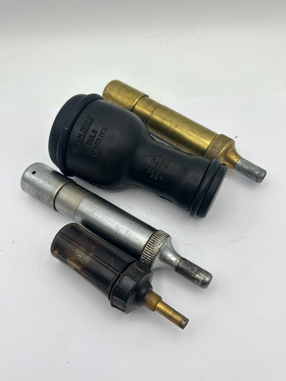 Lot 241: Three Vintage Automobile Grease Guns and One John...