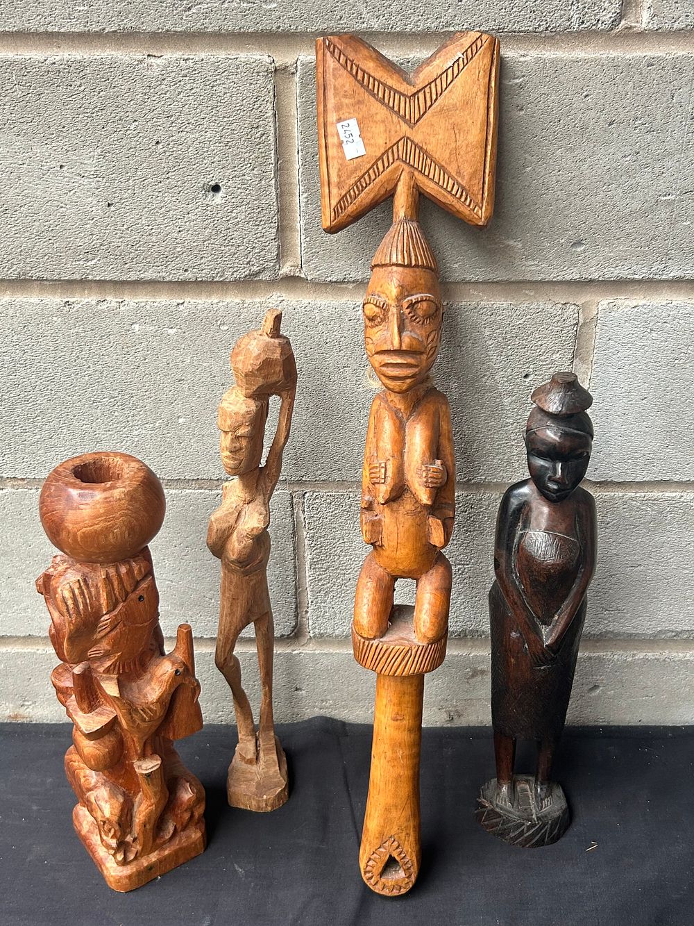 Lot 257: Four Nigerian Hand Carved Figures Tallest 22".