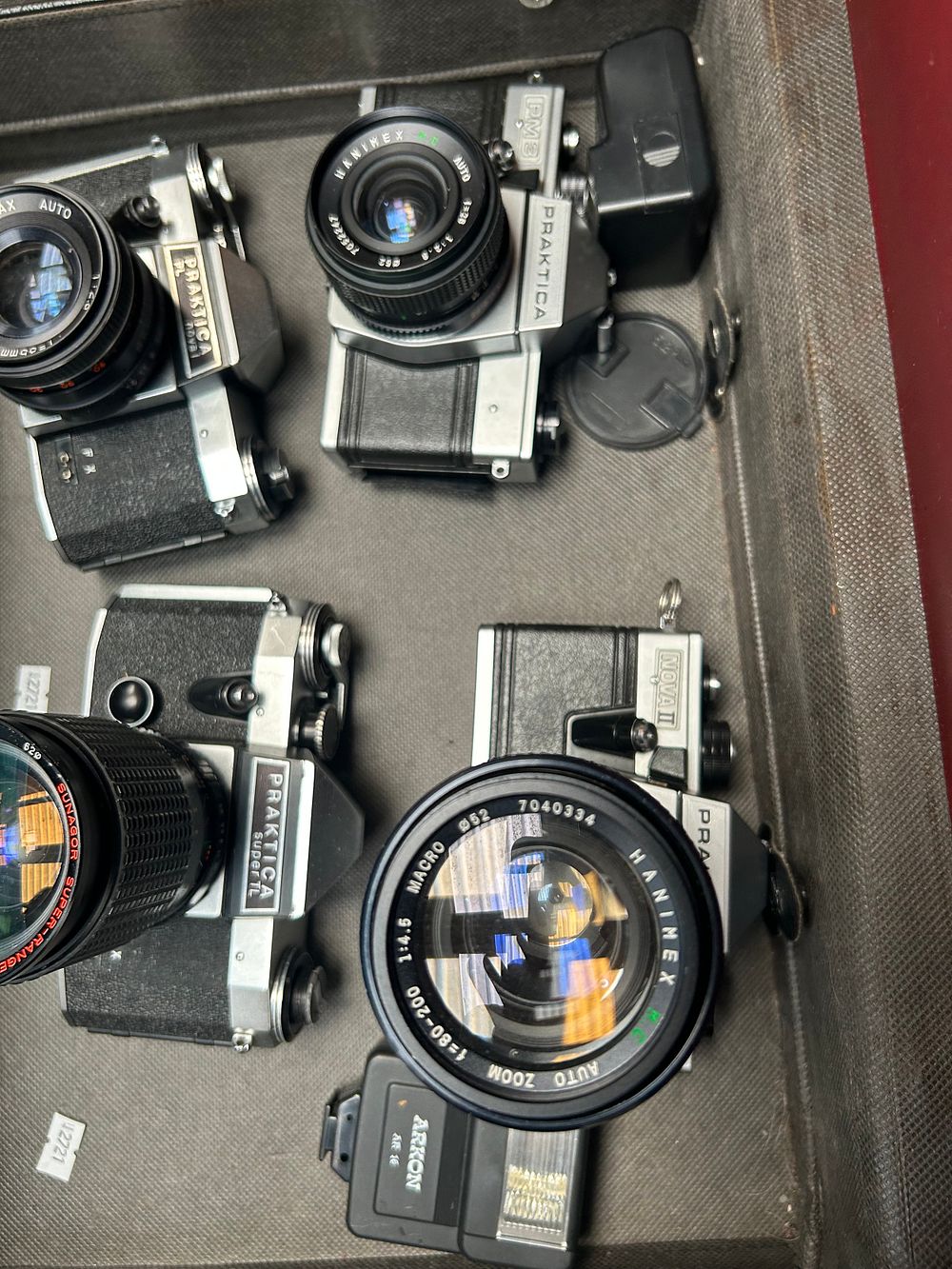 Lot 270: Case Containing Various Praktica Cameras.