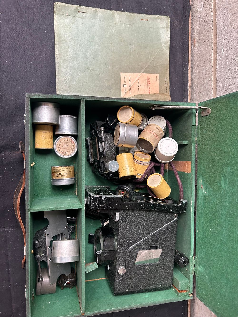 Lot 273: Vintage Cased Projector With Accessories And Film.