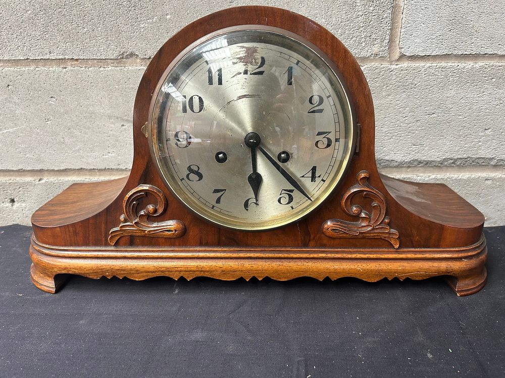 Lot 295: Large Wooden Napoleon Clock 19" x 11".