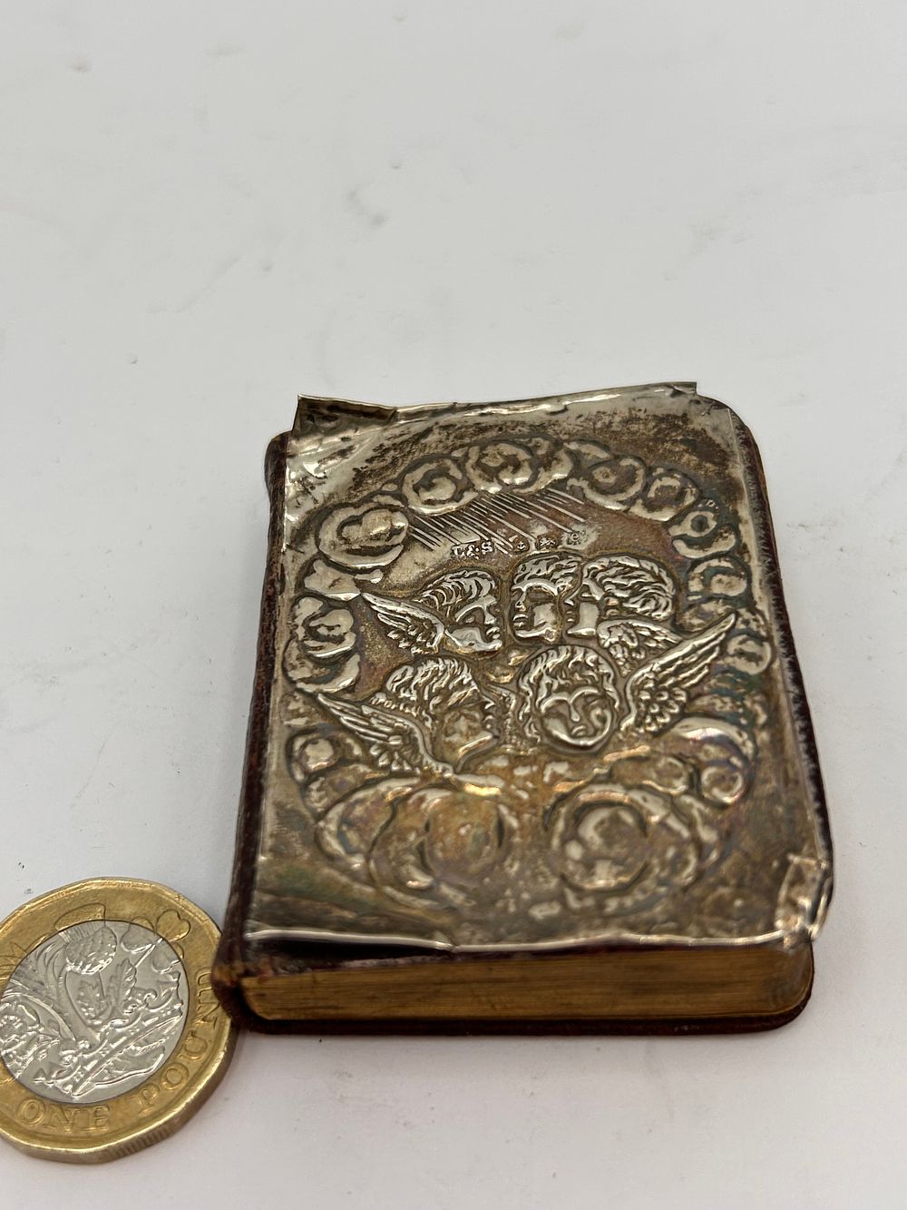 Lot 324: Antique Silver Fronted Prayer Book With Cherub Detail.
