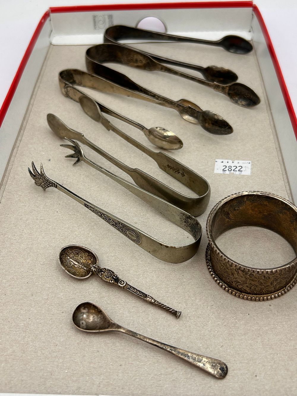 Lot 326: Collection Of Sugar Nips Etc Including Silver Examples.